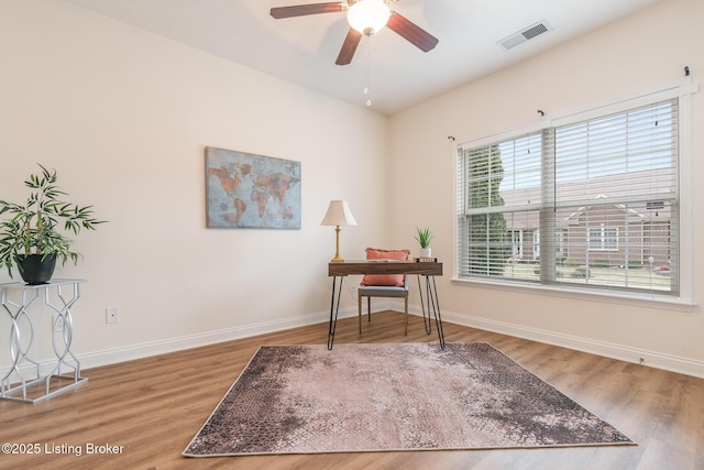 office featuring ceiling fan and hardwood / wood-style floors