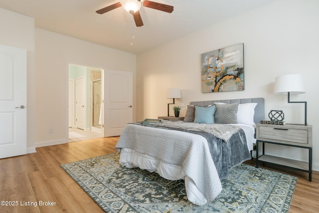 bedroom with hardwood / wood-style floors and ceiling fan