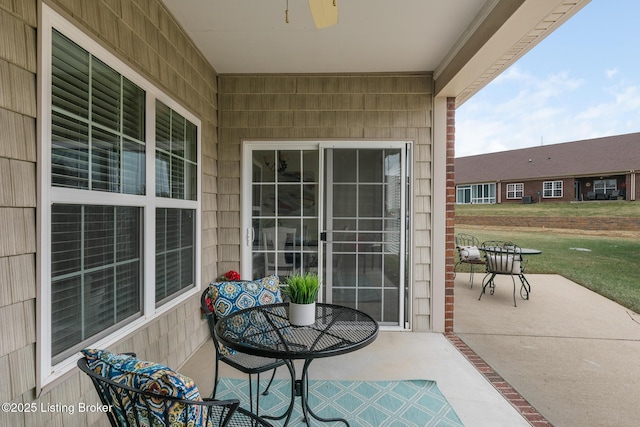 view of patio / terrace with ceiling fan