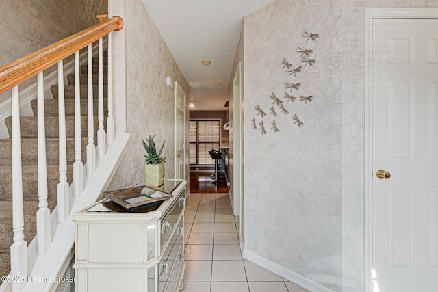 corridor with light tile patterned flooring