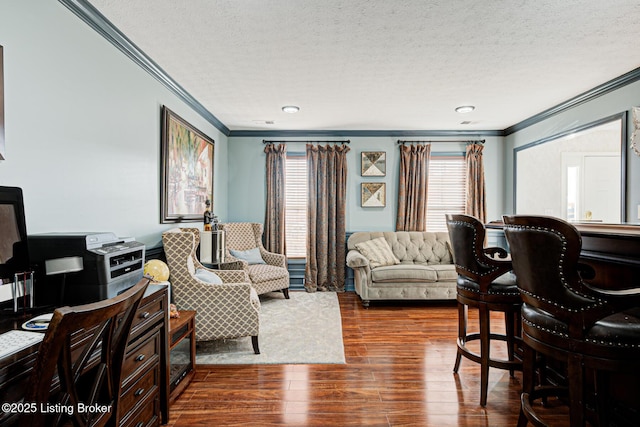 home office featuring crown molding, dark hardwood / wood-style floors, and a textured ceiling