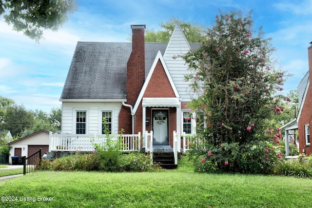 view of front of home featuring a garage and a front lawn