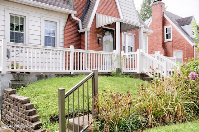 exterior space with a lawn