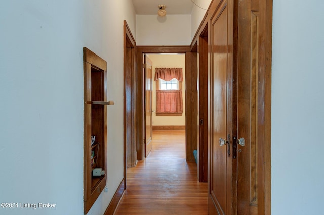 corridor featuring light wood-type flooring