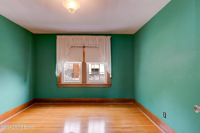 empty room with light wood-type flooring