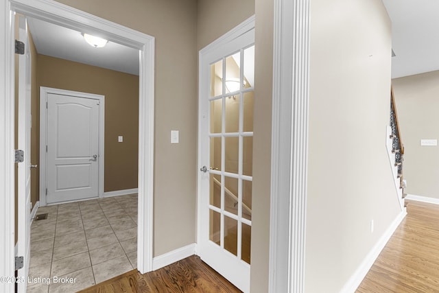 corridor featuring light wood-type flooring