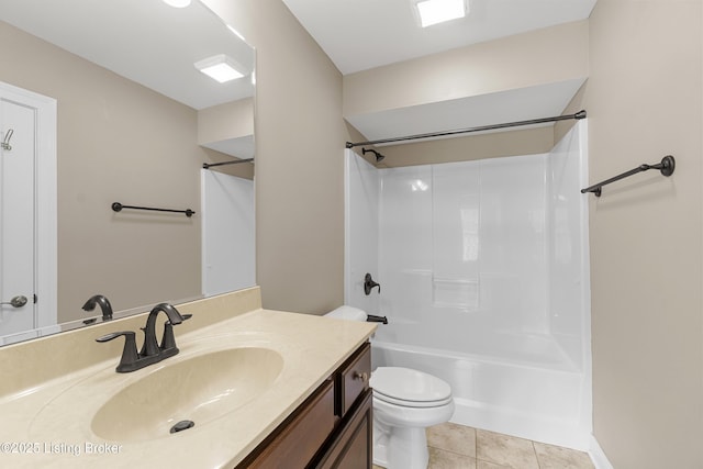 full bathroom with shower / tub combination, tile patterned floors, toilet, and vanity