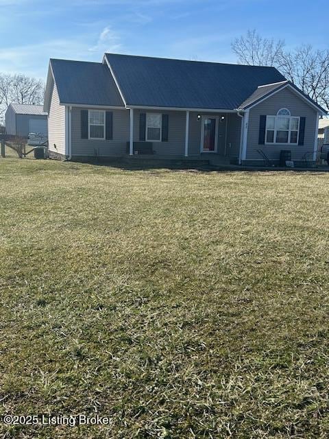 single story home featuring a front yard