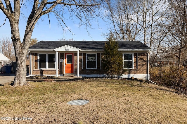 ranch-style home with a front yard