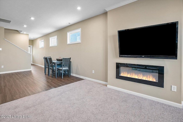 unfurnished living room featuring dark colored carpet