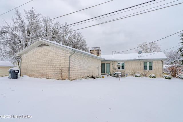 view of snow covered property