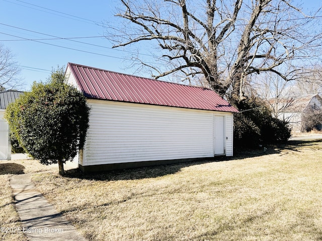 garage featuring a yard