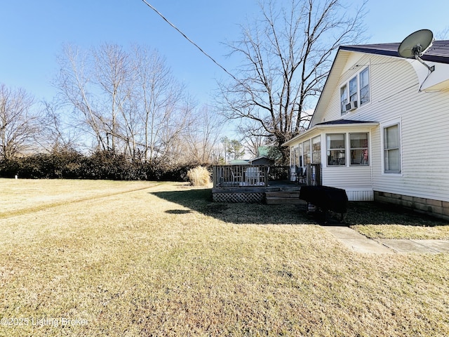 view of yard featuring a deck