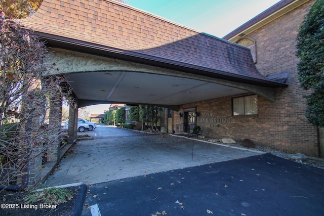 exterior space featuring a carport