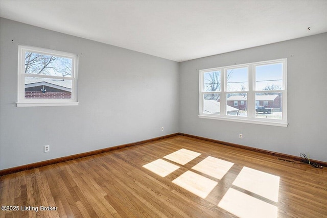 empty room featuring light hardwood / wood-style floors