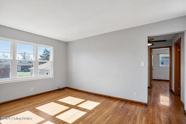 empty room featuring hardwood / wood-style flooring