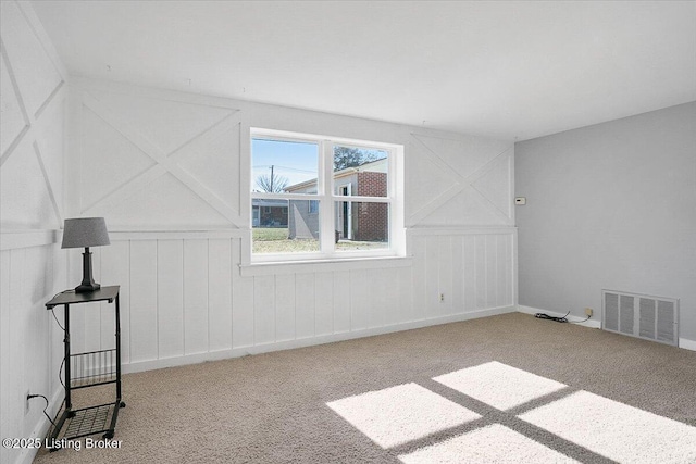 additional living space featuring carpet floors