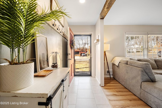 entryway featuring light tile patterned flooring