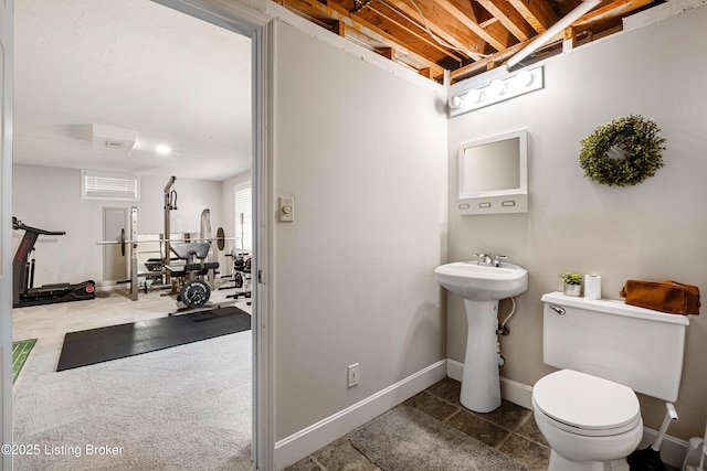 bathroom with toilet and sink