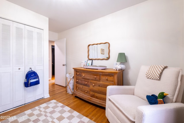 sitting room with light hardwood / wood-style floors