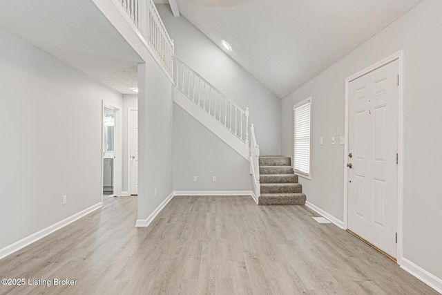 entrance foyer featuring light wood-type flooring