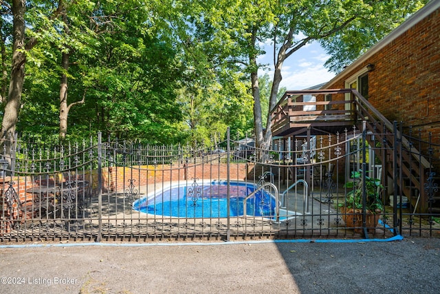 view of swimming pool featuring a patio