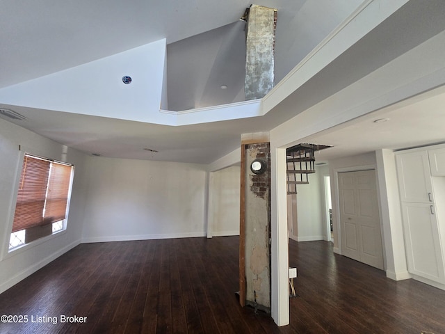 unfurnished living room featuring dark hardwood / wood-style floors