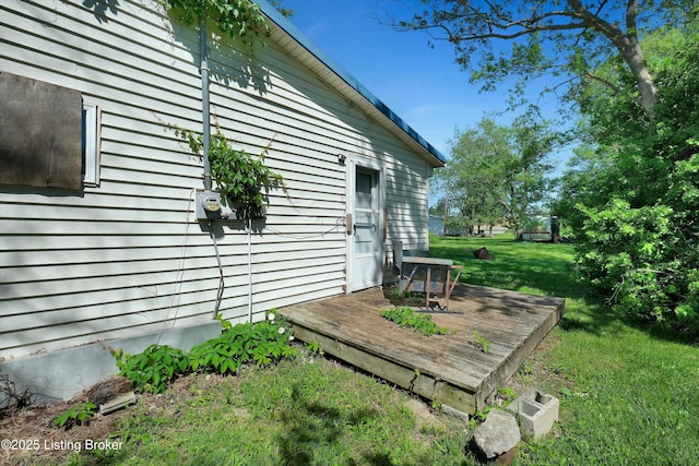 105 Sherman St, Millwood, KY 42762 - view of side of home featuring a wooden deck and a lawn