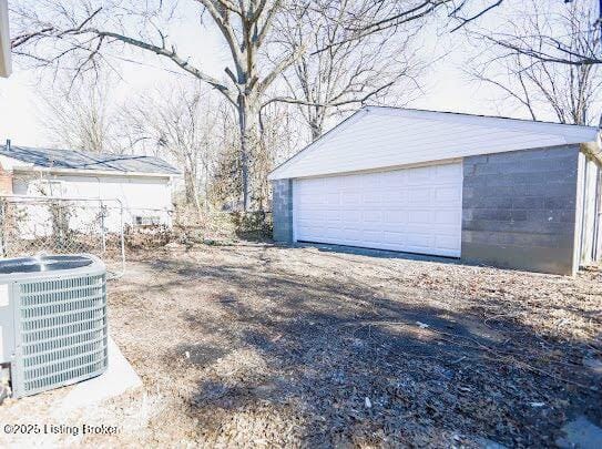 garage with central AC unit