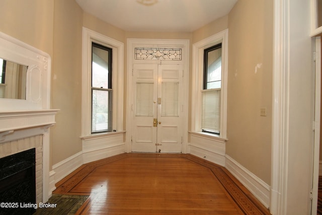 foyer with hardwood / wood-style floors