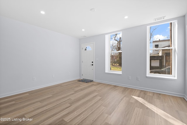 entrance foyer with light wood-type flooring