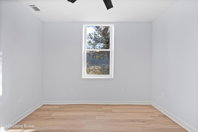 unfurnished room featuring ceiling fan and light hardwood / wood-style floors