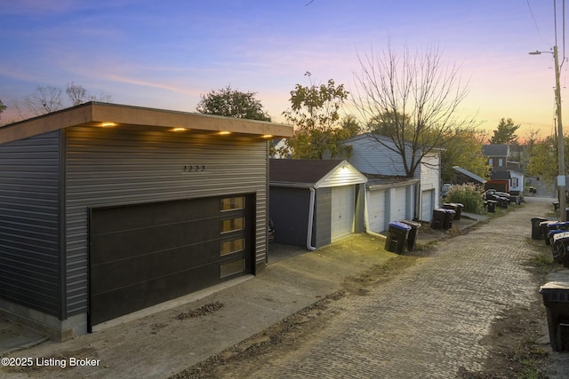 view of property exterior at dusk