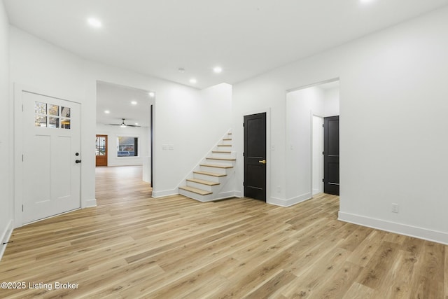 unfurnished living room featuring light hardwood / wood-style flooring