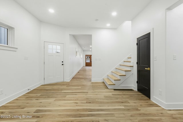 foyer with light hardwood / wood-style flooring