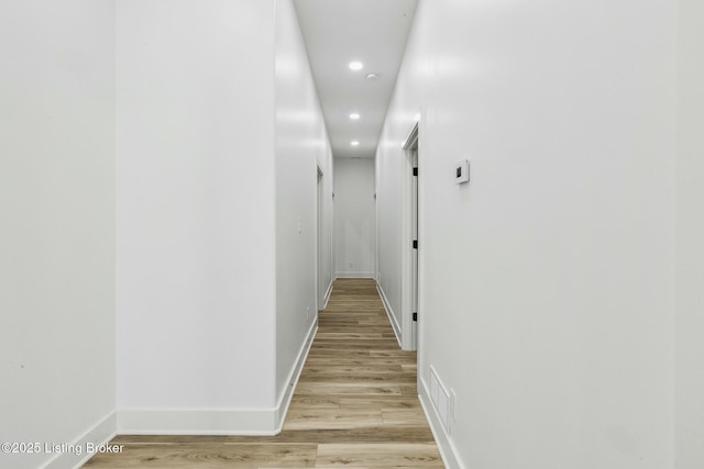 hallway featuring light wood-type flooring