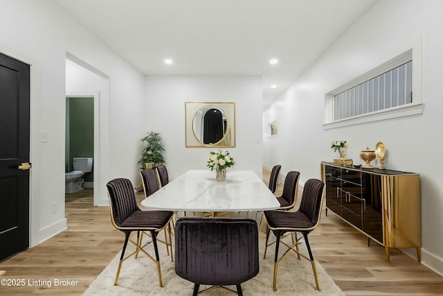 dining space featuring light hardwood / wood-style floors