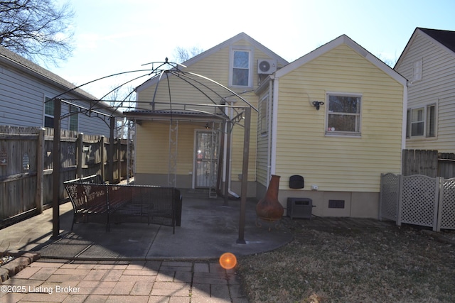 rear view of house featuring a patio