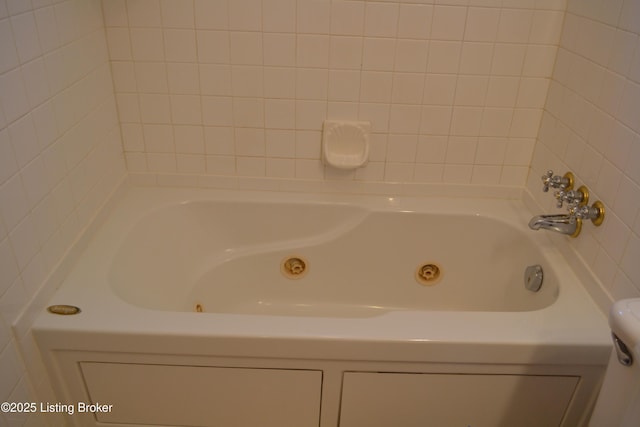 bathroom featuring a tub