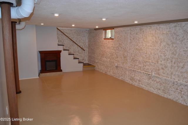 basement with a textured ceiling