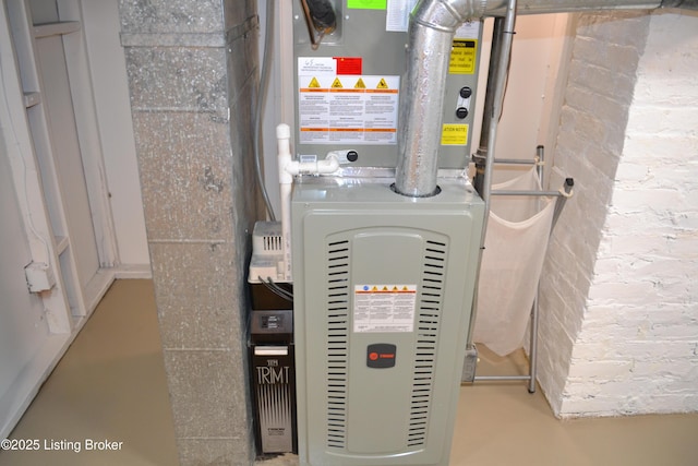 utility room with heating unit