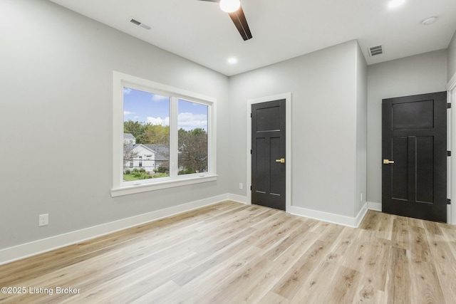 foyer entrance featuring ceiling fan and light hardwood / wood-style floors