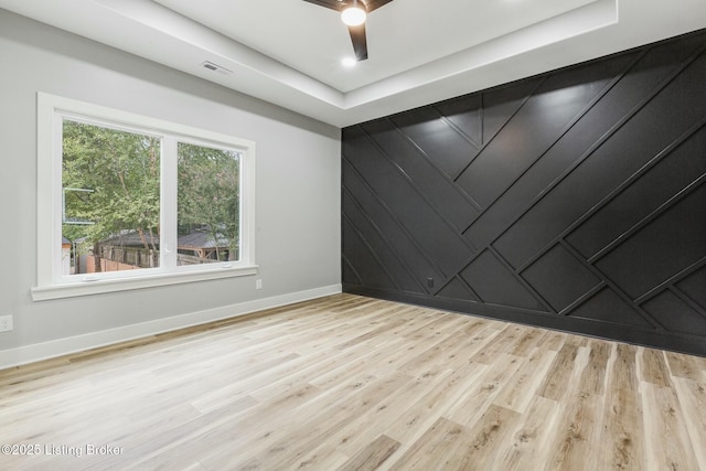 unfurnished room featuring light wood-type flooring