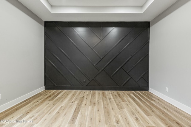 spare room featuring light hardwood / wood-style flooring