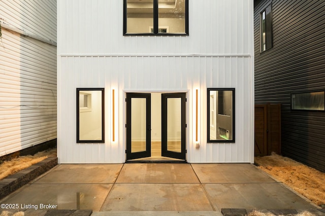 entrance to property with a patio area