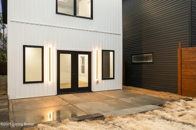 back of house featuring a patio and french doors