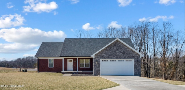 view of front of home featuring a garage and a front yard