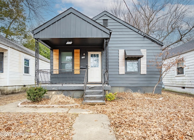 bungalow-style home with a porch