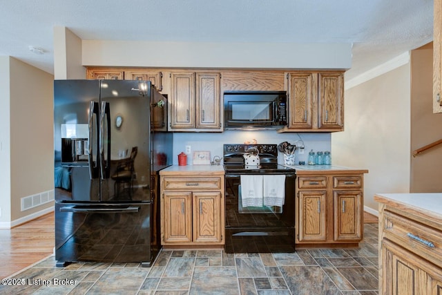 kitchen with black appliances