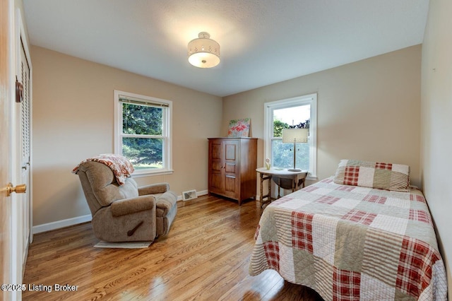 bedroom featuring light hardwood / wood-style flooring